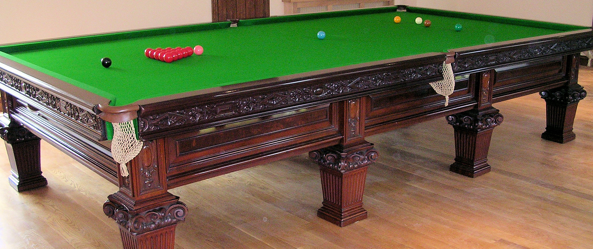 Full Size Billiard table by Riley, carved mahogany